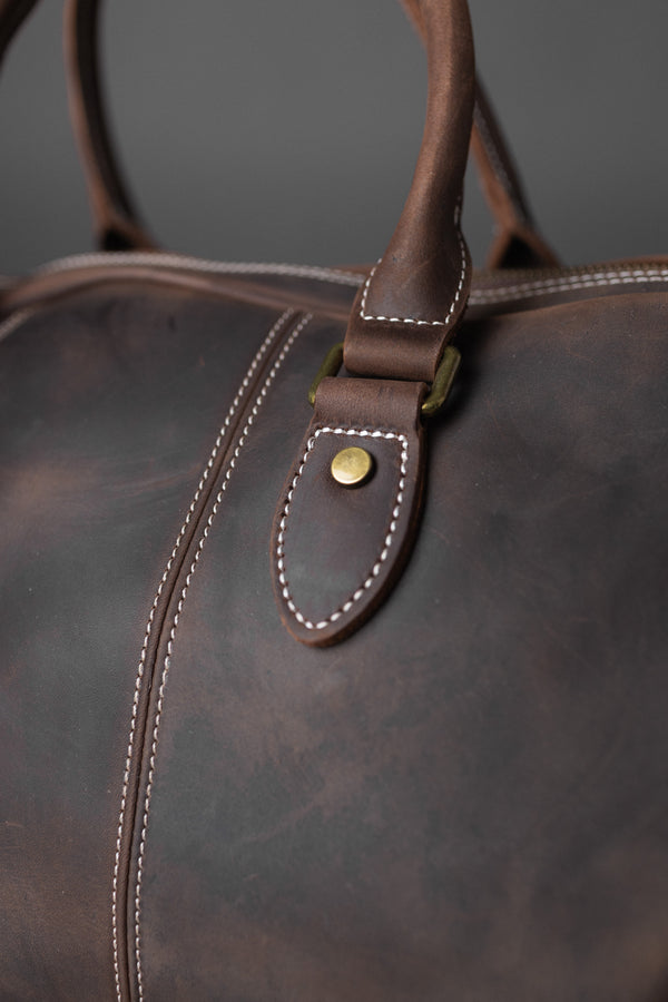 BOLSO DE CUERO GENUINO TYR DARK BROWN