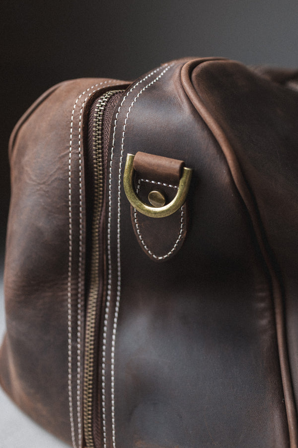 BOLSO DE CUERO GENUINO TYR DARK BROWN